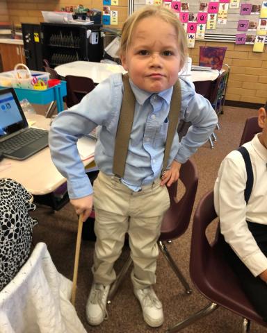Richard is a young first grade boy dressed up as 100 year old